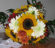 Beautiful autumn bridal bouquet with sunflowers