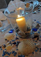 Beach candle with seashells