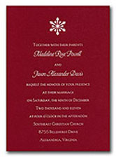 Christmas wedding invitations in red and white with a snowflake