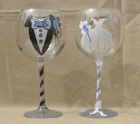Engraved wedding gifts of glasses for bride an groom