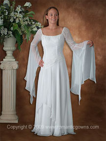 Bridal gown made to look like a witches dress is perfect for a Halloween wedding theme