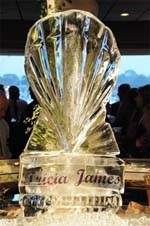 Ice sculpture of a sea shell with the names of the bride and groom