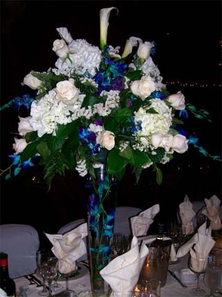 Gorgeous wedding centerpiece with Blue and white flowers