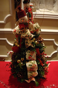 Winter Wedding Reception Centerpieces Decorated with ornaments found at a craft store