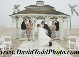 Bridal couple in gazebo  on the beach