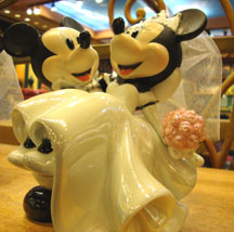Disney wedding theme cake topper of Mickey holding Minnie