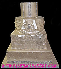Picture of a white on white pearlized wedding cake.