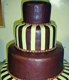 Chocolate grooms cake with lime green verticle strips
