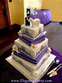 Beautiful square wedding cake with alternating white and purple tierspurple