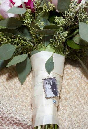 Unique Wedding Bouquets with a small picture on the bouquet holder