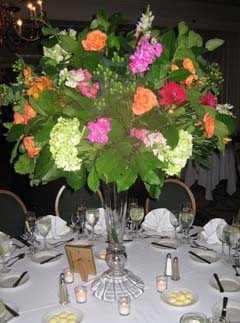 Stunning centerpieces with a tall clear vase