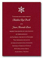 Christmas wedding invitations in red and white with a snowflake
