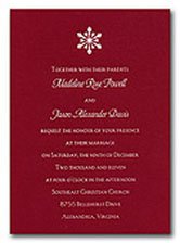 Christmas wedding invitations in red and white with a snowflake