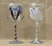 Engraved wedding gifts of glasses for bride an groom