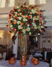 Tall wedding centerpieces of fall flowers