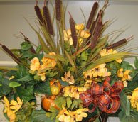 Fall wedding themes centerpiece of fall flowers
