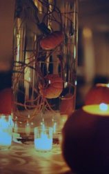 Centerpieces with pumpkins inside