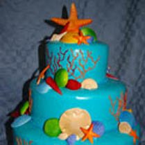 Sandcastle wedding cake with starfish