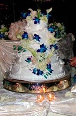 White wedding cake with blue flowers