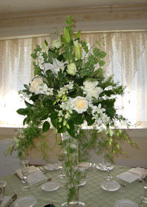 Wedding flower centerpieces of white flowers