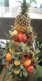 Fruit wedding centerpiece of assorted fruit shaped as a tree