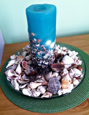 Blue Candle and Seashells for an Inexpensive Centerpiece