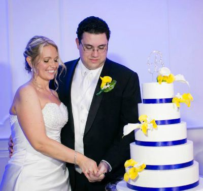 Wedding Colors Theme - Bride and Groom Cutting the Cake