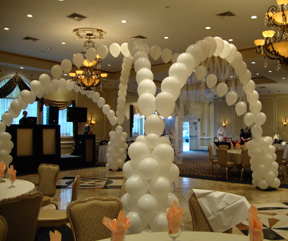 Balloon arches are fun wedding decor ideas for the reception